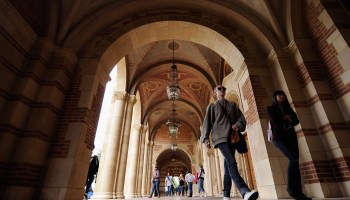 Students walk near Royce Hall on the campus of the University of California, Los Angeles.