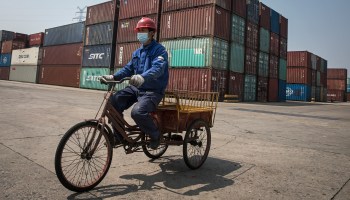 A worker at a container port in Wuhan, China, in April.