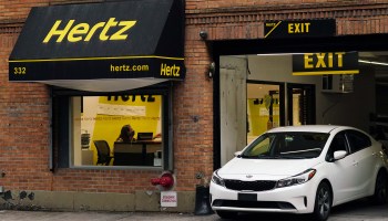 A Hertz car-rental office in New York. The company filed for bankruptcy after amassing $19 billion in debt.