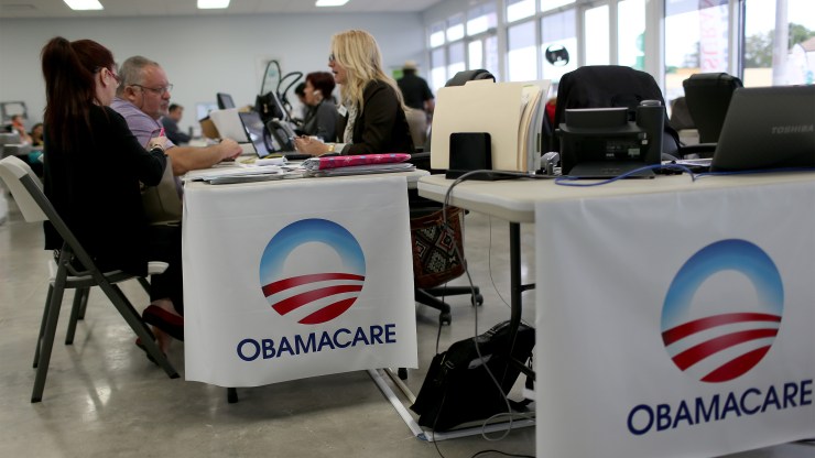 People enroll in insurance plans under the Affordable Care Act in 2015.