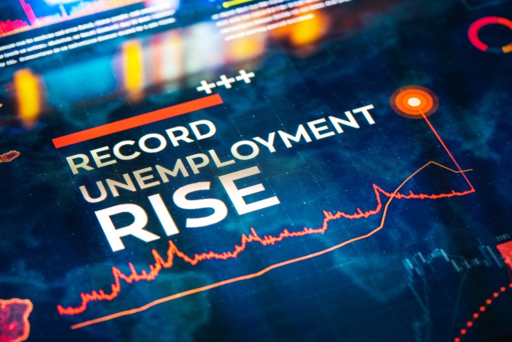 "Record unemployment rise" is displayed on a screen.