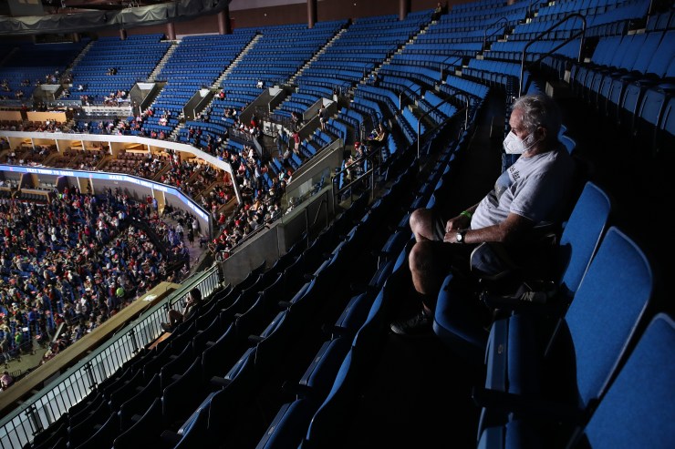 A supporter sits in the upper seats during a campaign rally for U.S. President Donald Trump at the BOK Center, June 20, 2020 in Tulsa, Oklahoma.