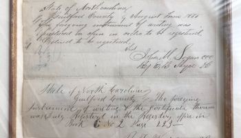 A former slave's free papers that Kimberly's dad bought at auction and she inherited.