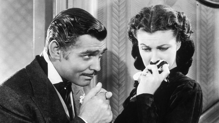 Rhett Butler (Clark Gable) kisses the hand of a tearful Scarlett O'Hara (Vivien Leigh) in "Gone With the Wind."
