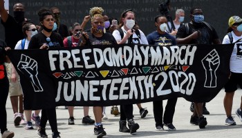 Marchers celebrating Juneteenth at the Martin Luther King, Jr. Memorial in Washington on Friday.