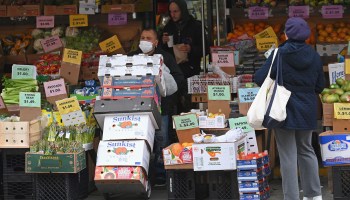 A worker restocks groceries at a supermarket in Brooklyn in March.