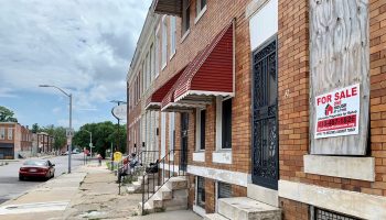 A vacant house is for sale on North Payson Street in Baltimore. In 2016, an abandoned building down the block collapsed and killed a man.