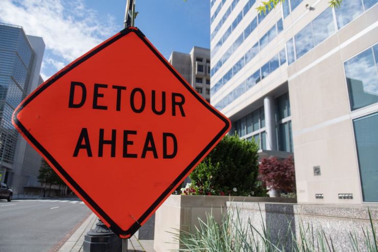 A "Detour" sign outside the offices of the International Monetary Fund in Washington, D.C. The economic downturn in the United States is likely to hurt the global economy, says economist Susan M. Collins of the University of Michigan.