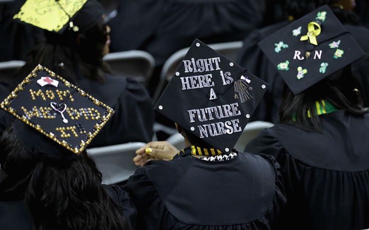 Graduates of Bowie State University, an HBCU in Maryland, attended ceremonies with messages on their mortarboard hats in 2013.