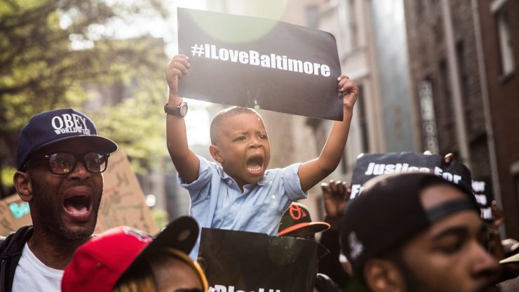 Protesters in Baltimore demand better police accountability and racial equality following the death of Freddie Gray in April 2015.
