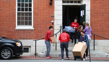 Students move out of dorm rooms at Harvard University in March.