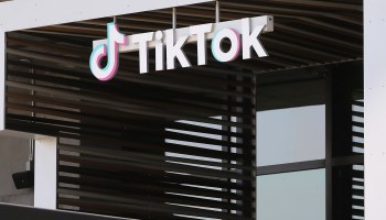 The logo of Chinese video app TikTok is displayed outside of the company's office space on August 27, 2020 in Culver City, California.