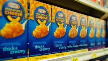 Boxes of Kraft Macaroni & Cheese on a grocery store shelf. Demand for the product has surged this year as Americans are cooking more and eating at restaurants less.