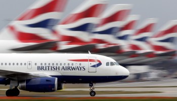 A British Airways plane lands at Heathrow in London. The airline's cost-cutting agenda is stirring resistance.