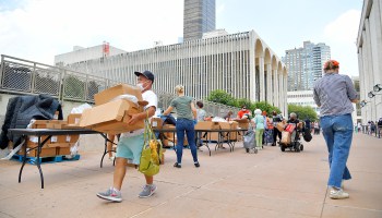 A food distribution event for people in need of food in New York in July.
