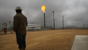 A gas flare burns at a Permian Basin plant. A study found that companies in the region wasted $750 million worth of natural gas in 2018.