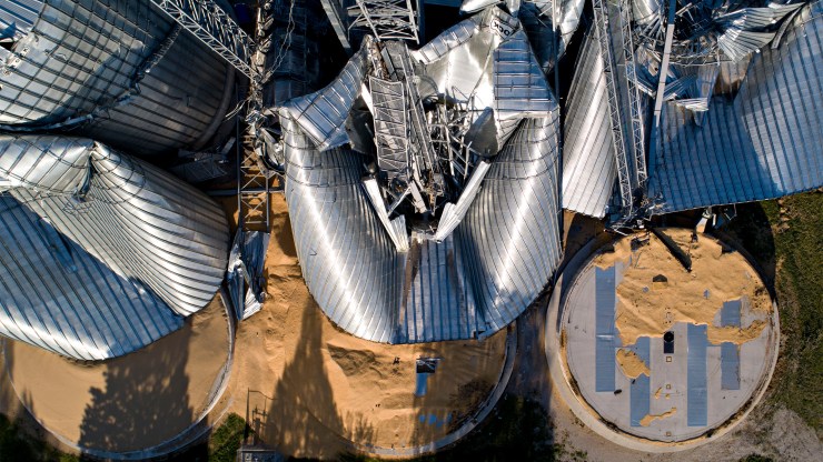 Damaged grain bins in Luther, Iowa, on Aug. 11. The state is also suffering a drought.