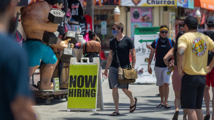 A store advertising a job opening in Venice Beach, California.