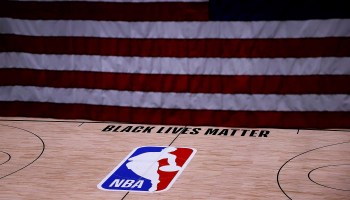 The Black Lives Matter logo on an NBA court. Many prominent athletes have committed themselves to social activism.