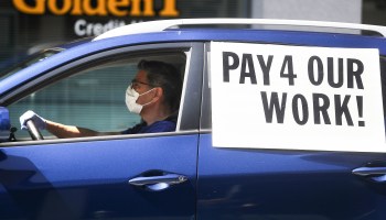 A ride-share driver in Los Angeles calls for enforcing California Assembly Bill 5, which requires some companies to reclassify independent contractors as employees.