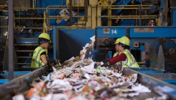 Workers sort recycled materials at a Maryland facility. Compared to pre-pandemic times, more refuse is being generated by homes and less by businesses.
