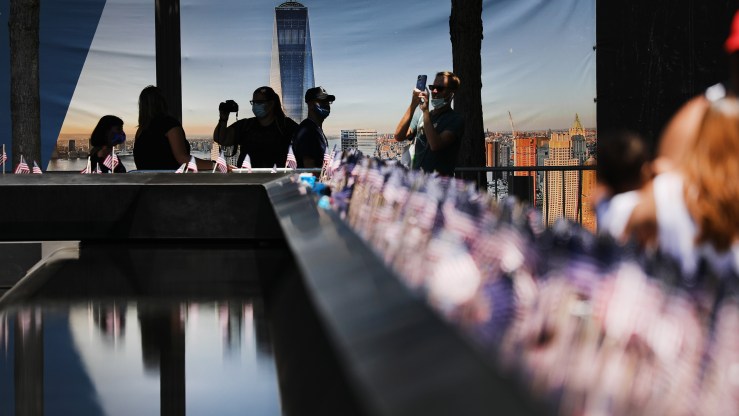 People visit the 9/11 memorial plaza in New York City.