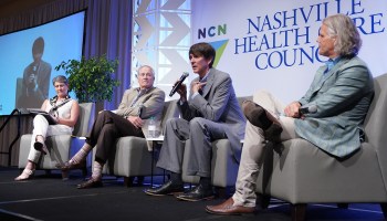 Bobby Frist, chairman of the Nashville Health Care Council’s board of directors, speaks onstage during an event.