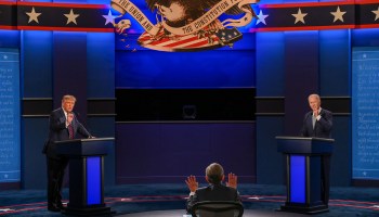 President Donald Trump and Democratic presidential candidate and former Vice President Joe Biden exchange arguments as moderator and Fox News anchor Chris Wallace (center) raises his hands to stop them during the first presidential debate at Case Western Reserve University and Cleveland Clinic in Cleveland, Ohio, on September 29, 2020.