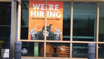 A "We're Hiring" sign is seen in a store front window on September 04, 2020 in Miami, Florida.