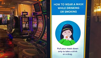 A sign at Peppermill Resort Spa Casino in Reno, Nevada, informs patrons of new protocols during the COVID-19 pandemic. Nevada has not banned smoking at casinos, unlike some tribal and state governments that have imposed bans, including New Jersey and Pennsylvania.