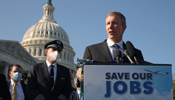 United Airlines CEO Scott Kirby joins fellow airline executives, union heads and politicians at a news conference calling for additional financial support to avoid layoffs on Sept. 22 outside the U.S. Capitol.