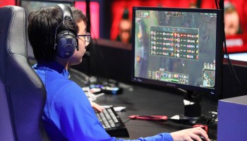 A student plays at a League of Legends College Championship match in 2017.