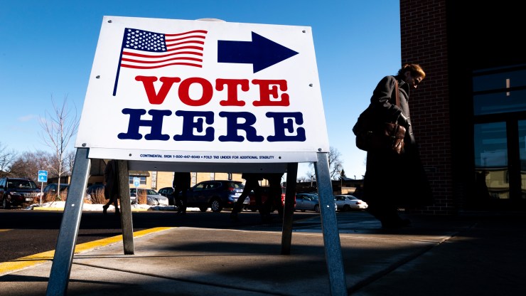 A voter arrives at a polling place in Minneapolis in March for the primary elections.