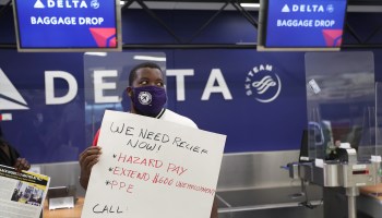 An unemployed airport worker calling for extended unemployment benefit in August.