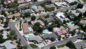A residential neighborhood in Las Vegas. Nearly 18 million people could refinance their mortgages at lower rates, a mortgage data firm estimates.