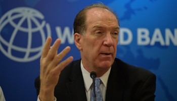 World Bank President David Malpass gestures as he speaks during a press conference at the World Bank office in New Delhi on October 26, 2019.
