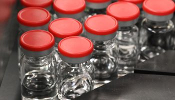 Capped vials for the large-scale production and supply of the University of Oxford's COVID-19 vaccine candidate are pictured.
