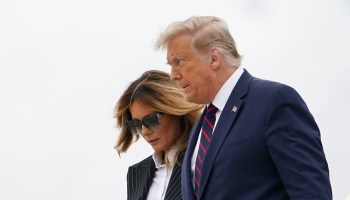 President Donald Trump and First Lady Melania Trump step off Air Force One upon arrival at Cleveland Hopkins International Airport in Cleveland, Ohio on September 29, 2020.