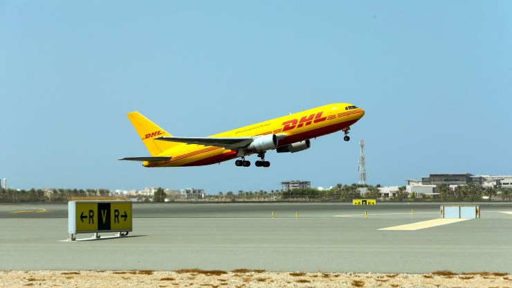 A DHL plane is pictured taking off from the Muscat international airport in the Omani capital on October 1, 2020.