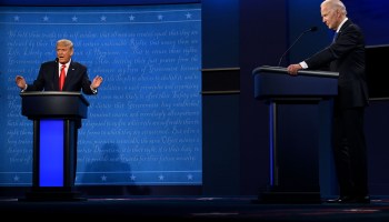 President Donald Trump speaks as Democratic presidential candidate and former Vice President Joe Biden looks on, during the final presidential debate on Thursday.