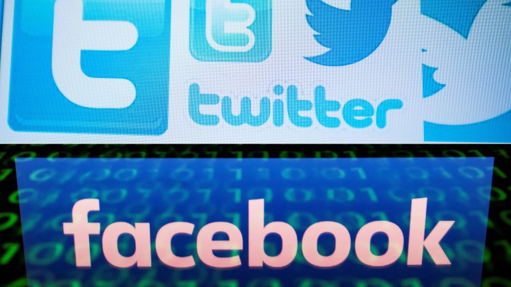 A combination of photos shows an illustration of Twitter logos on a computer screen in Beijing and an illustration of the Facebook logo reflected on a tablet in Paris.