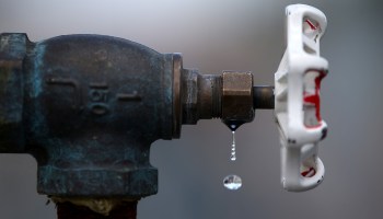 Water drips from a faucet at the Dublin San Ramon Services District (DSRSD) residential recycled water fill station on April 8, 2015 in Pleasanton, California.
