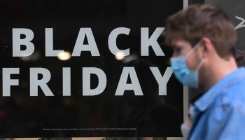A sign announces a price markdown for Black Friday on the display window of a shop in Madrid, Spain, on Nov. 23, 2020.