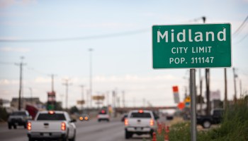 A road sign showing the Midland city limit is seen on July 29 in Midland, Texas.