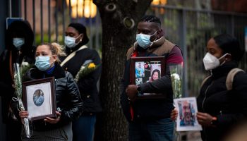 Nurses and health care workers mourn their colleagues who died due to COVID-19 during a demonstration outside Mount Sinai Hospital in Manhattan in April.