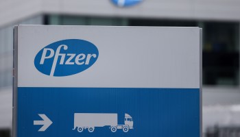The Pfizer logo is pictured at a factory in Puurs, Belgium, where COVID-19 vaccines are being produced for Britain, on December 3, 2020.