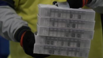 Vials in boxes containing the Pfizer-BioNTech Covid-19 vaccine are prepared to be shipped at the Pfizer Global Supply Kalamazoo manufacturing plant in Kalamazoo, Michigan on December 13, 2020.