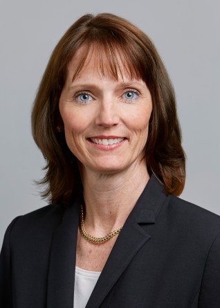 A portrait of Karen Young, PwC's health industries leader.