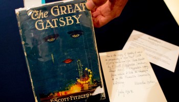 A copy of "The Great Gatsby" by F. Scott Fitzgerald is displayed in 2013 at Sotheby's in New York.
