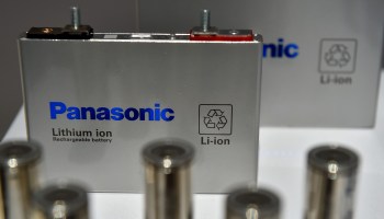 Panasonic lithium-ion batteries for vehicles are displayed at a convention in 2018. The element is widely used to power cars and devices.